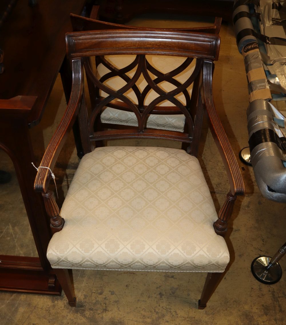 A set of eight Sheraton style mahogany dining chairs (2 with arms)